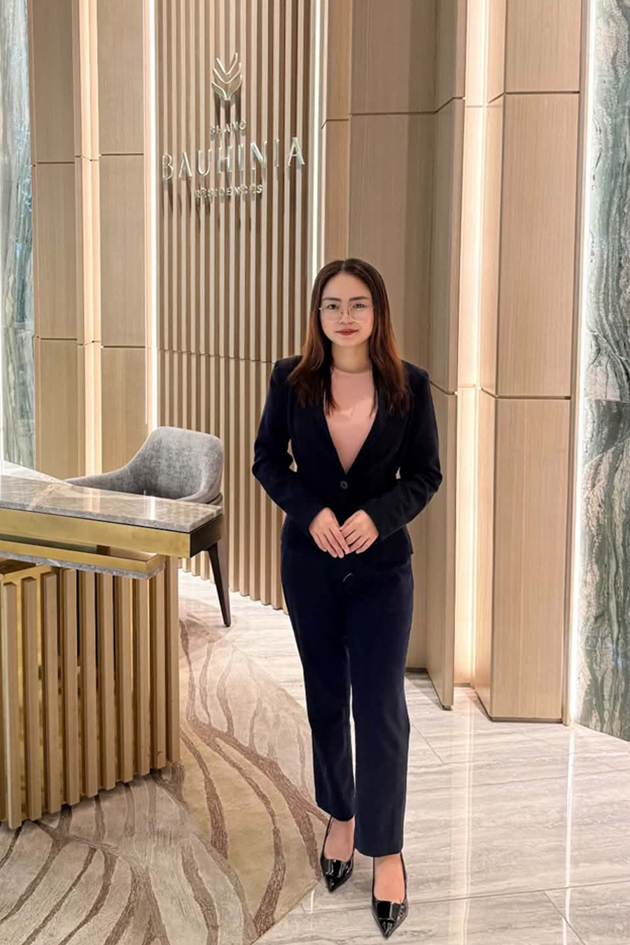 Portrait of Mylene Taganas, real estate professional (sample portrait — to be replaced with actual photo)